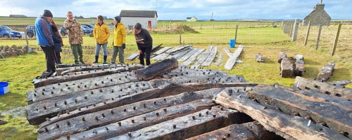 Initial recovery works of the Sanday wreck in February this year. © Wessex Archaeology